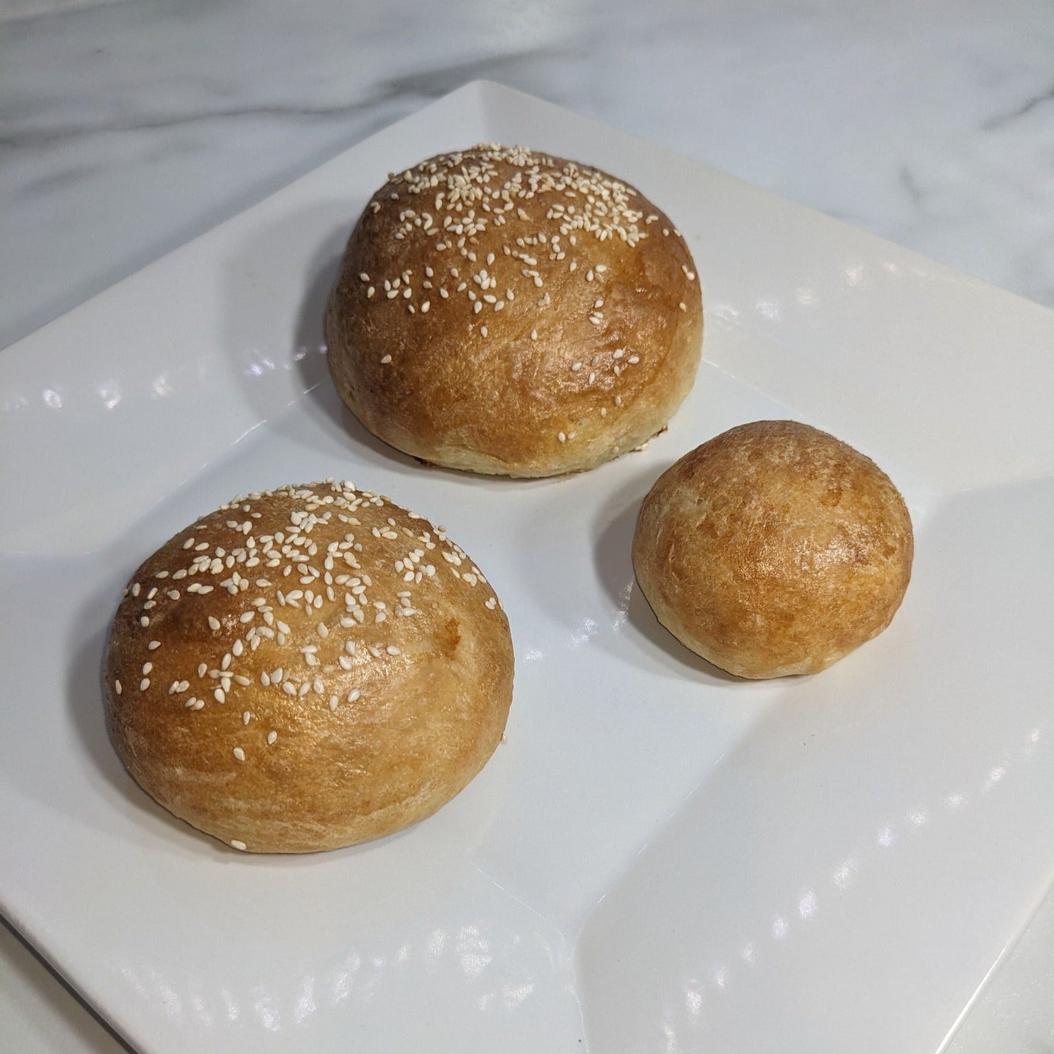 Image of small medium and large size buns